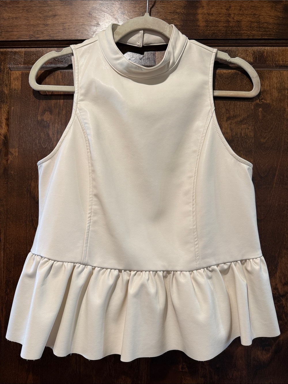 Fate Cream Sleeveless Peplum Mock Neck Top